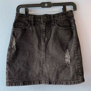 Black distressed denim skirt